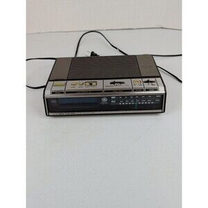 General Electric Silver & Woodgrain Blue Display Alarm Clock Radio Model#7-4646A